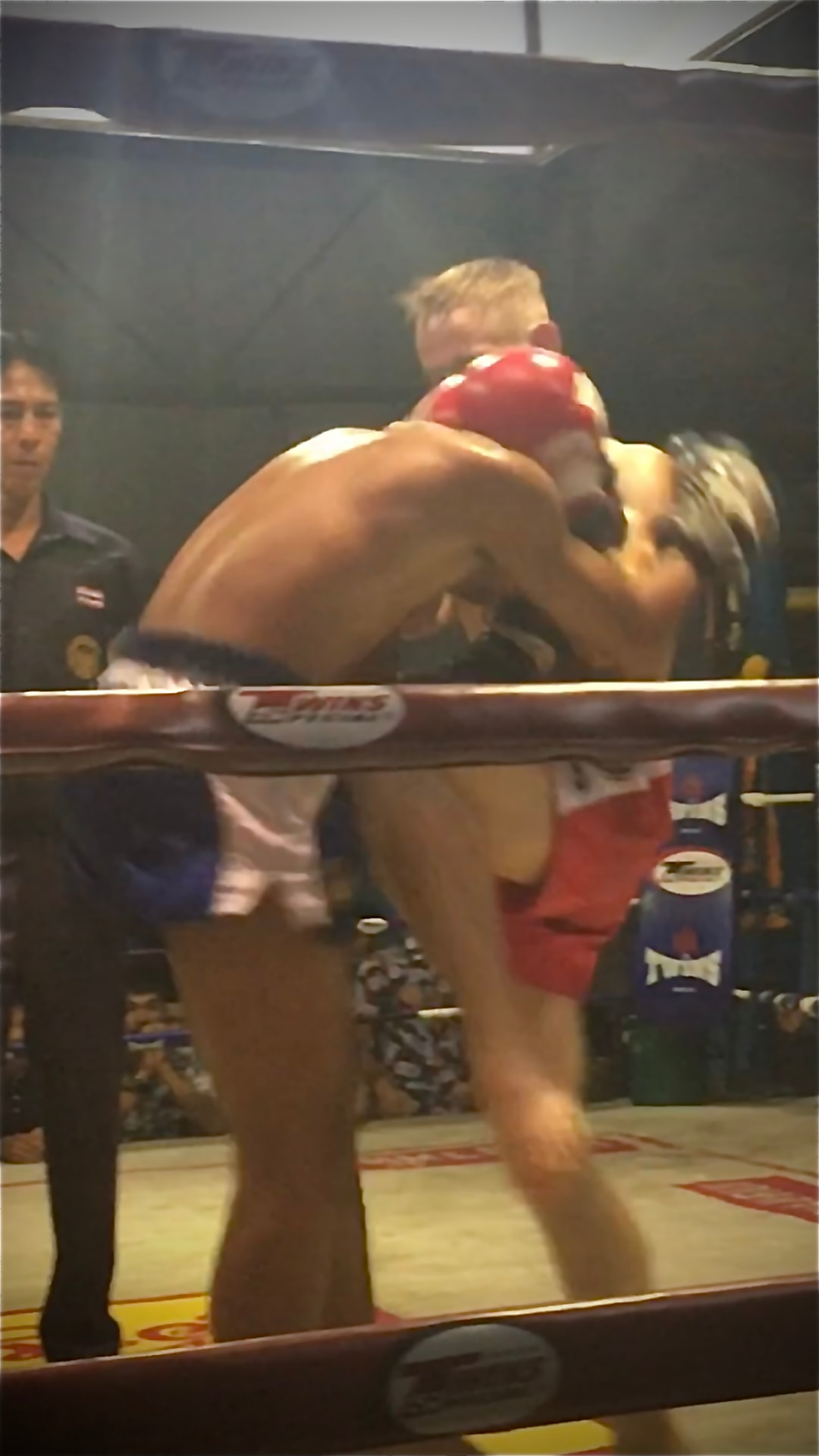 Muay Thai clinch exchange in the ring